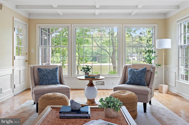 sunroom / solarium featuring beamed ceiling and coffered ceiling