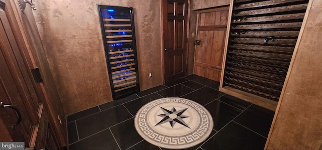 room details featuring tile patterned flooring and wine cooler