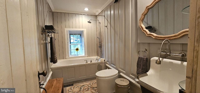 full bathroom featuring vanity, wooden walls, crown molding, and toilet