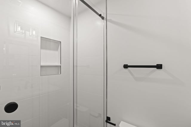 bathroom with an enclosed shower