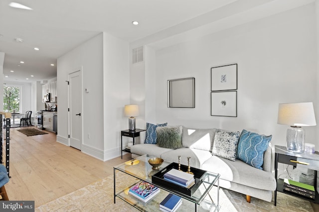 living room featuring light hardwood / wood-style flooring