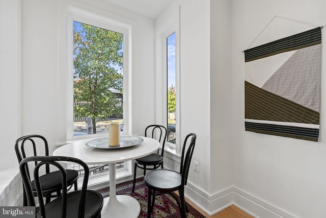 dining area featuring hardwood / wood-style flooring