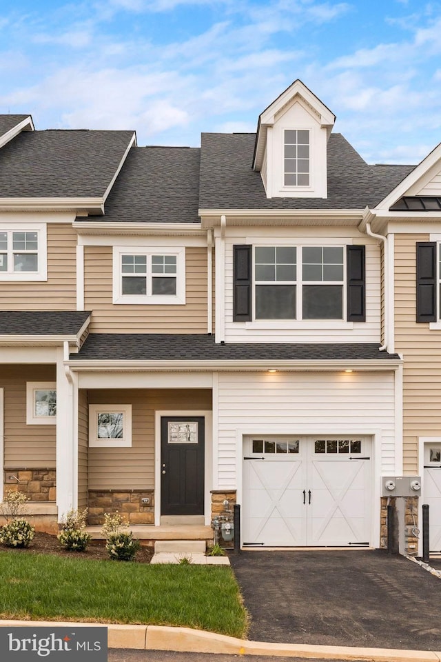 view of property featuring a garage