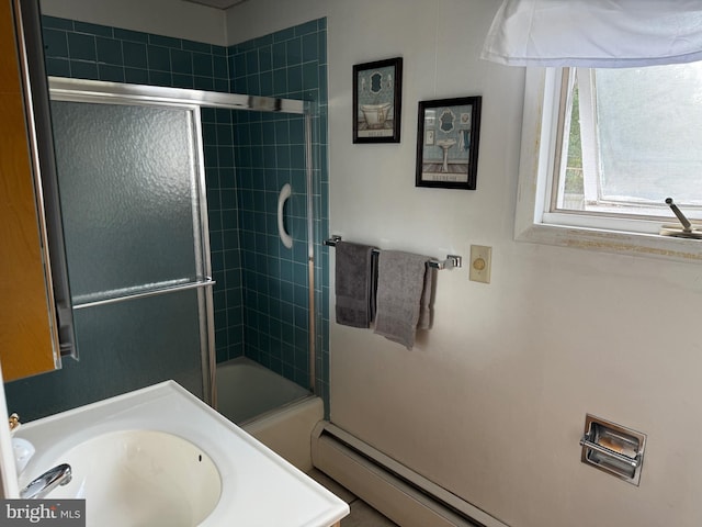 bathroom with bath / shower combo with glass door