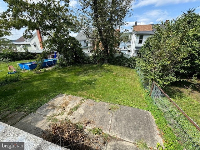 view of yard with a trampoline