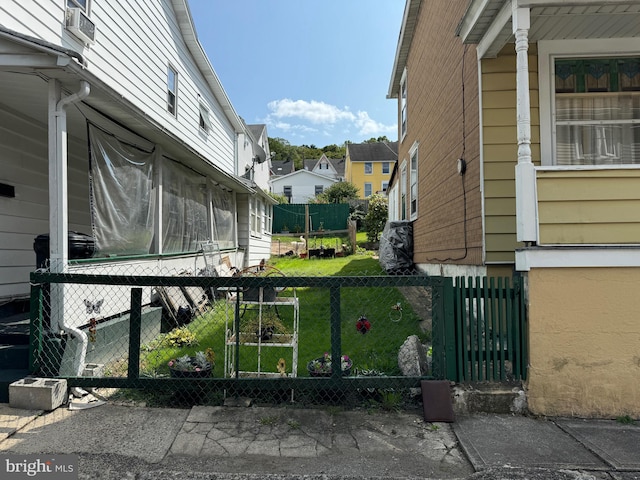 view of side of home featuring a lawn