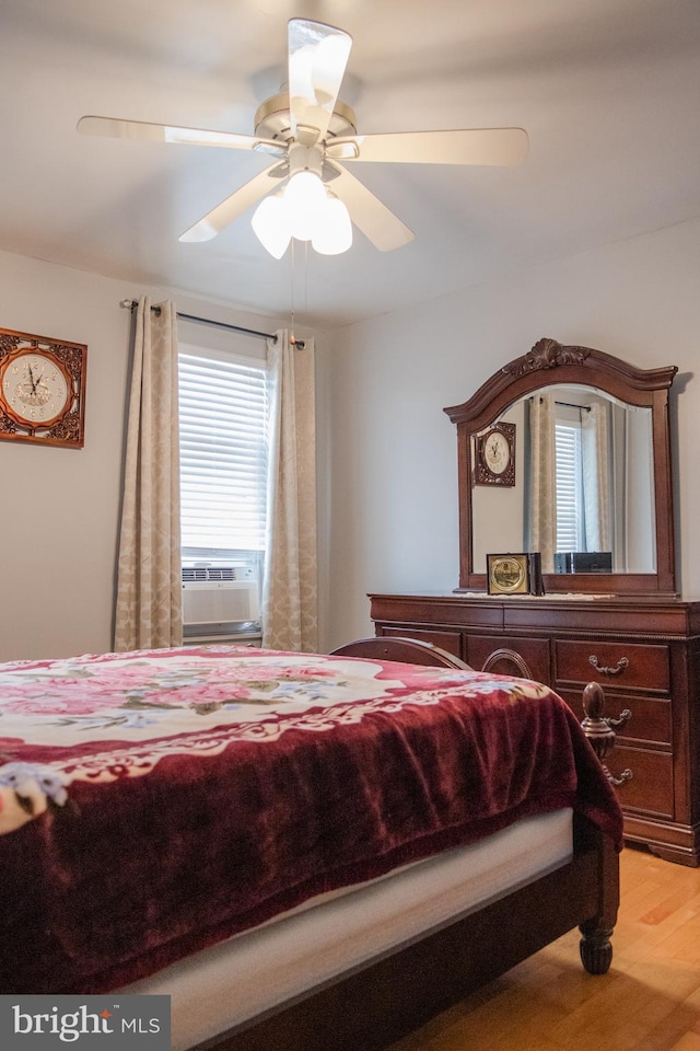 bedroom featuring ceiling fan and light wood-type flooring