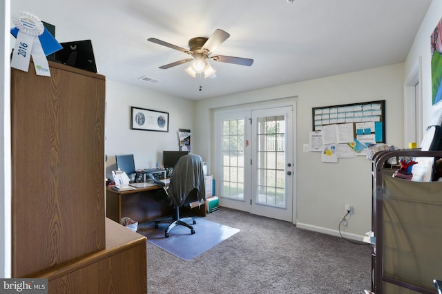 office area with carpet and ceiling fan