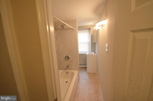 bathroom featuring sink, tile patterned floors, and baseboard heating