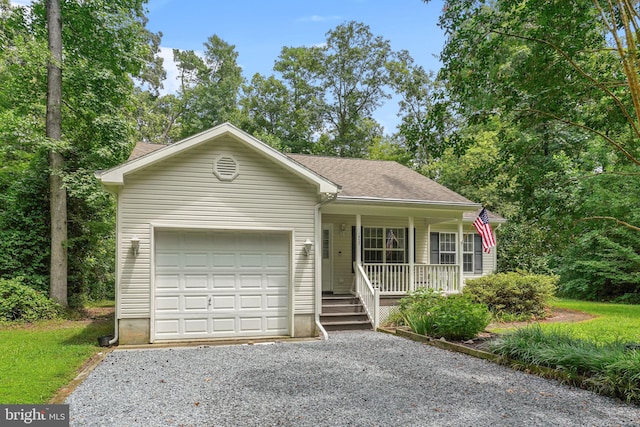 single story home featuring a garage and covered porch