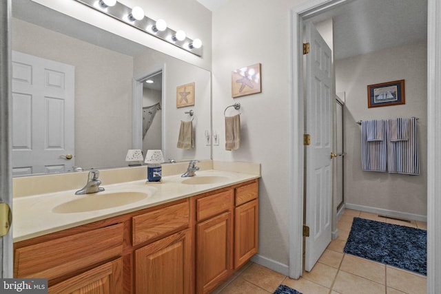 bathroom featuring vanity and tile patterned floors