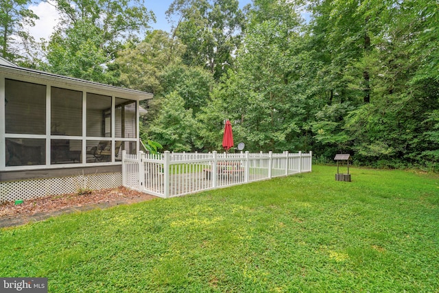 view of yard featuring a sunroom