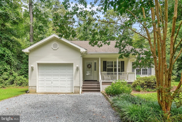 ranch-style home with a garage and a porch