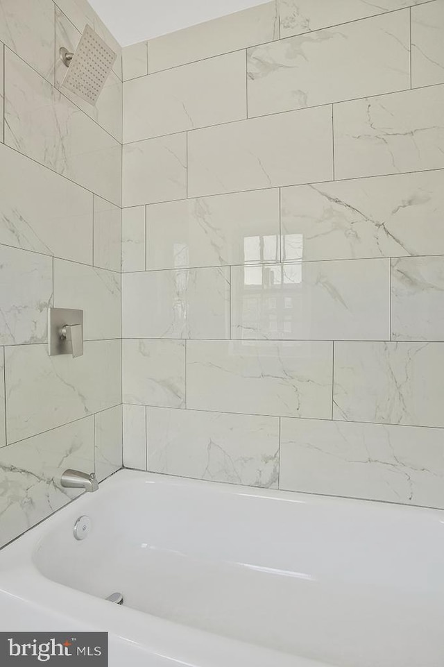 full bathroom featuring tub / shower combination