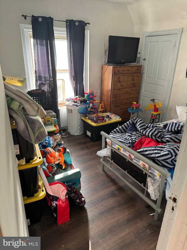 bedroom with wood-type flooring