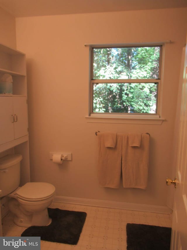 bathroom featuring toilet