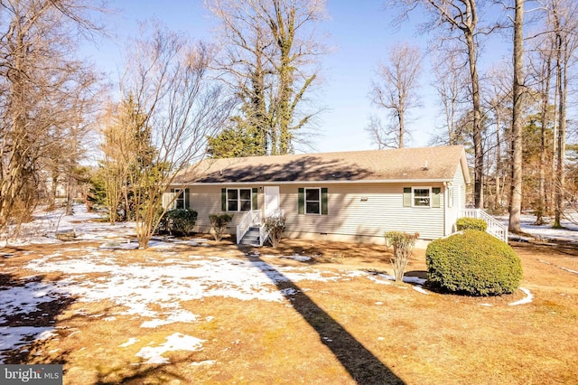 view of snow covered house