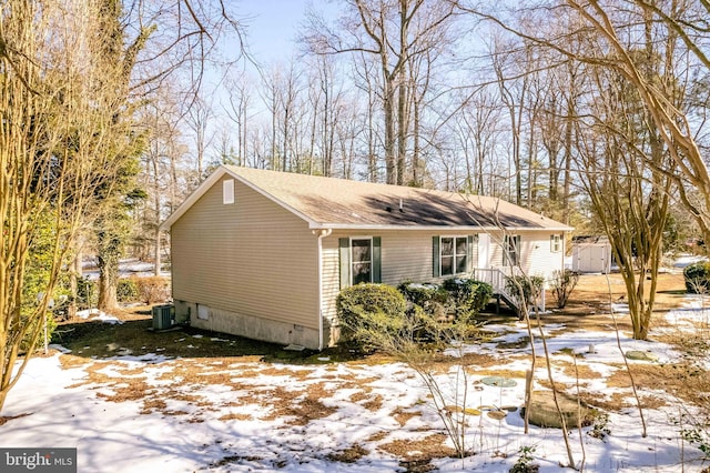 view of front of property with cooling unit