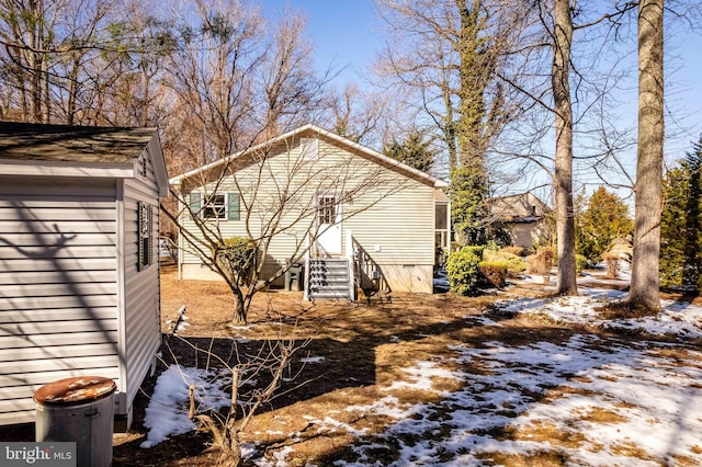 view of snow covered property