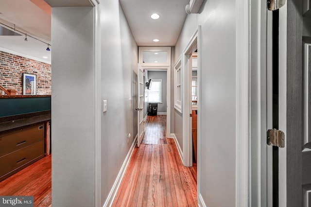 corridor featuring light wood-type flooring