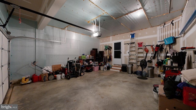 garage featuring a garage door opener