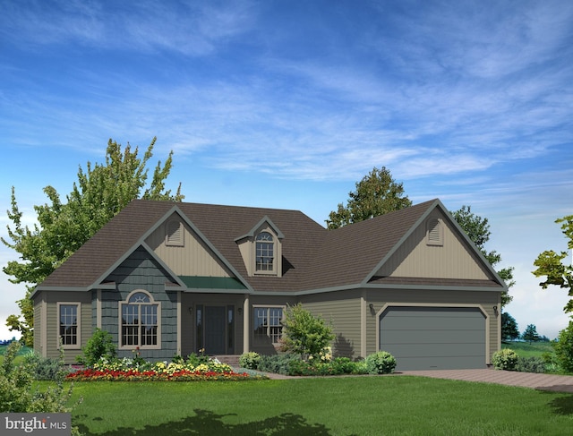 view of front of house with a garage and a front lawn