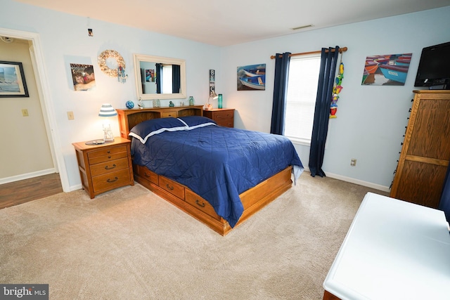 bedroom featuring light hardwood / wood-style floors