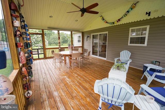 sunroom with vaulted ceiling and ceiling fan