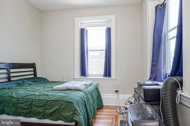 bedroom featuring wood-type flooring