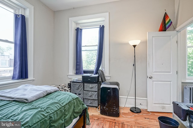 bedroom featuring hardwood / wood-style flooring