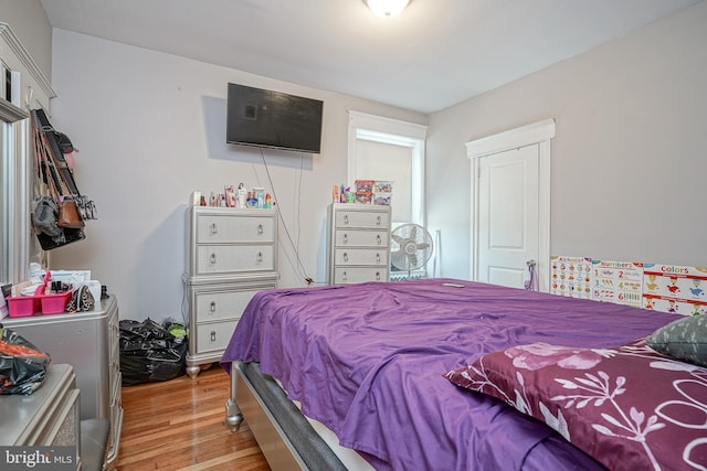 bedroom featuring light wood-type flooring