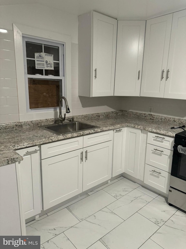 kitchen with white cabinets