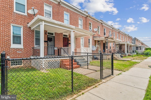 3220 Elmley Ave, Baltimore, MD 21213 - view of front facade featuring a front yard