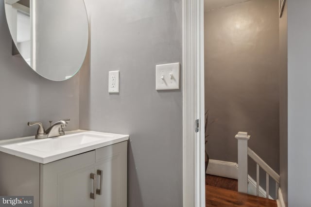 3220 Elmley Ave, Baltimore, MD 21213 - bathroom with vanity and hardwood / wood-style floors
