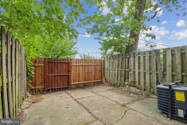 view of patio with central AC