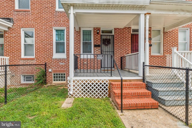 doorway to property with a porch