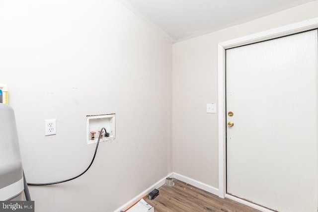 laundry area featuring washer hookup and light wood-type flooring