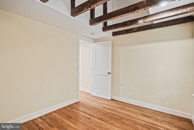 unfurnished room featuring light hardwood / wood-style flooring