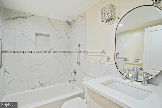 full bathroom with vanity, toilet, and tiled shower / bath combo