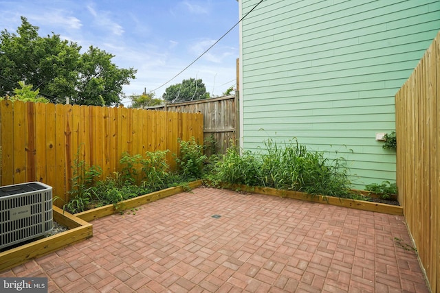 view of patio featuring central AC unit