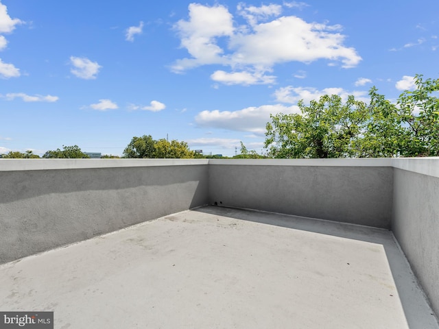 view of patio with a balcony