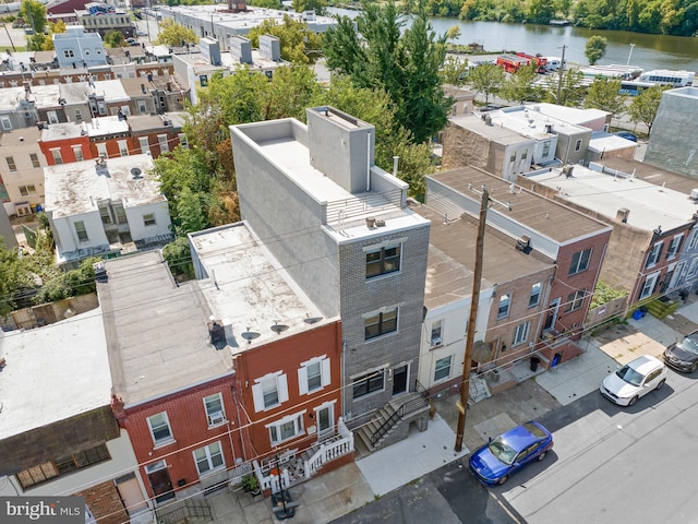 bird's eye view with a residential view and a water view