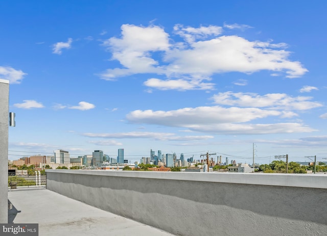 balcony featuring a city view