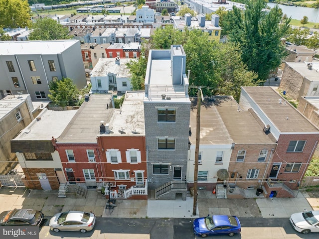 birds eye view of property with a residential view