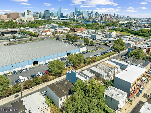 drone / aerial view featuring a city view