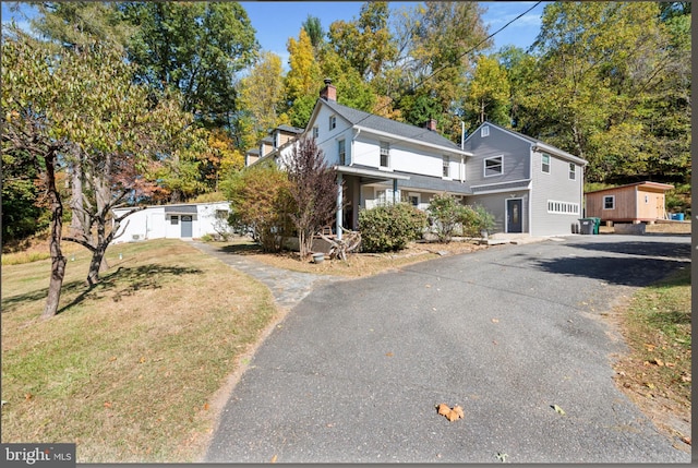 front facade with a front yard