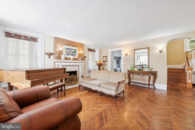 living room with parquet floors and a wealth of natural light