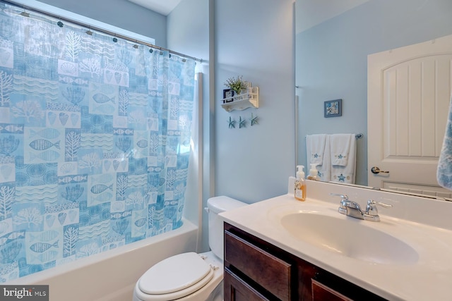 full bathroom with shower / bathtub combination with curtain, toilet, and vanity