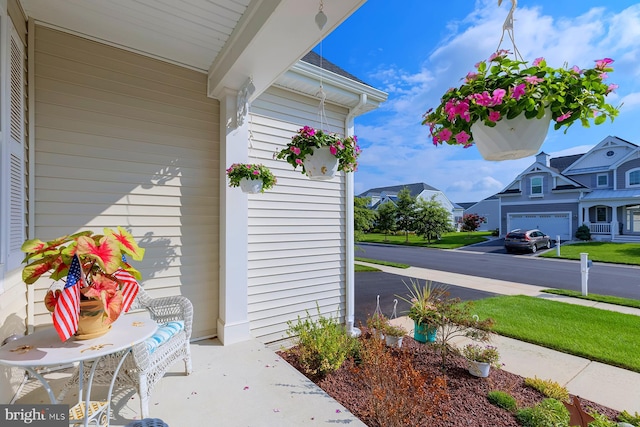 view of patio / terrace featuring a garage