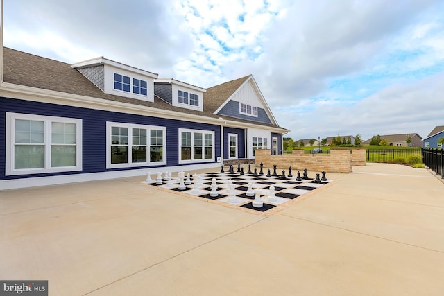 back of house with a patio